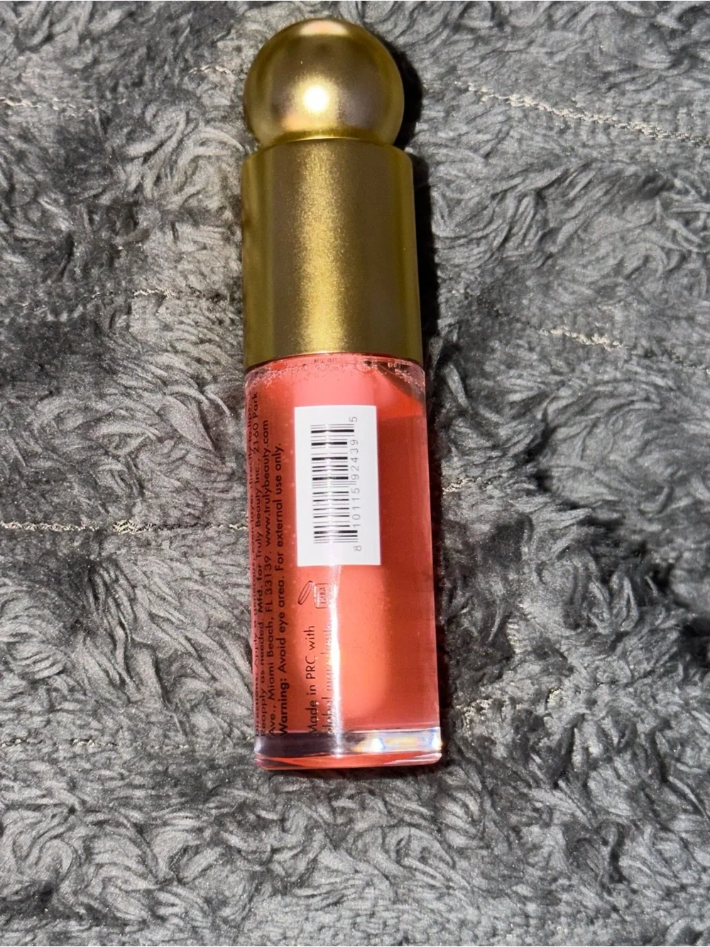 TRULY Soft Serve Luxury Lip Oil – Gold Cap with Pink Oil